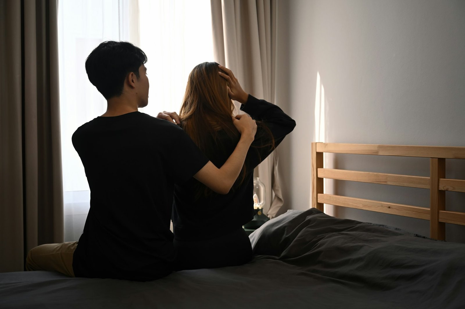 Loving husband comforting, expressing sympathy and understanding his wife.
