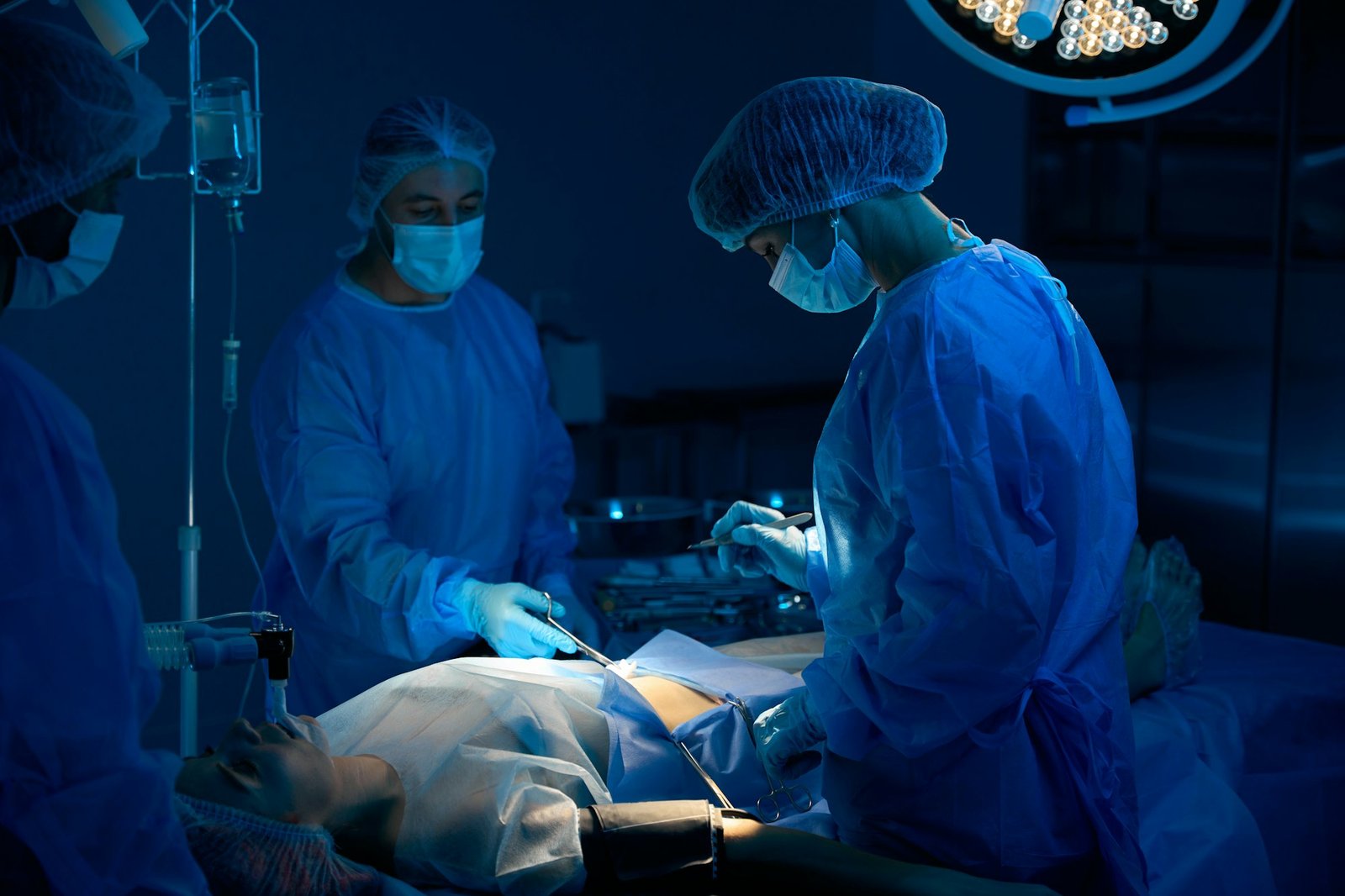Medical team doing critical operation to female patient saving life