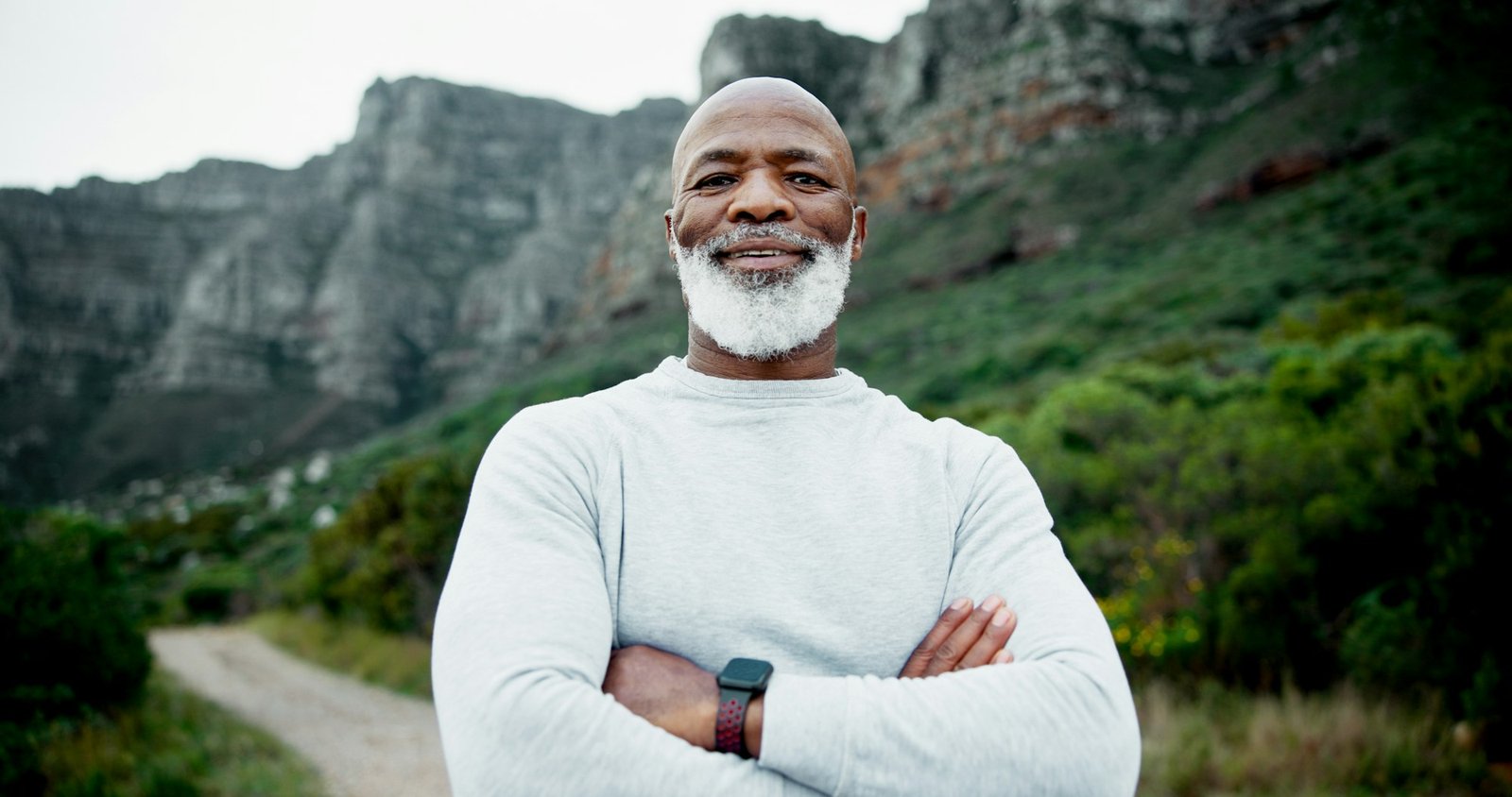 Portrait, senior runner or black man in nature for fitness, health and confidence in retirement to